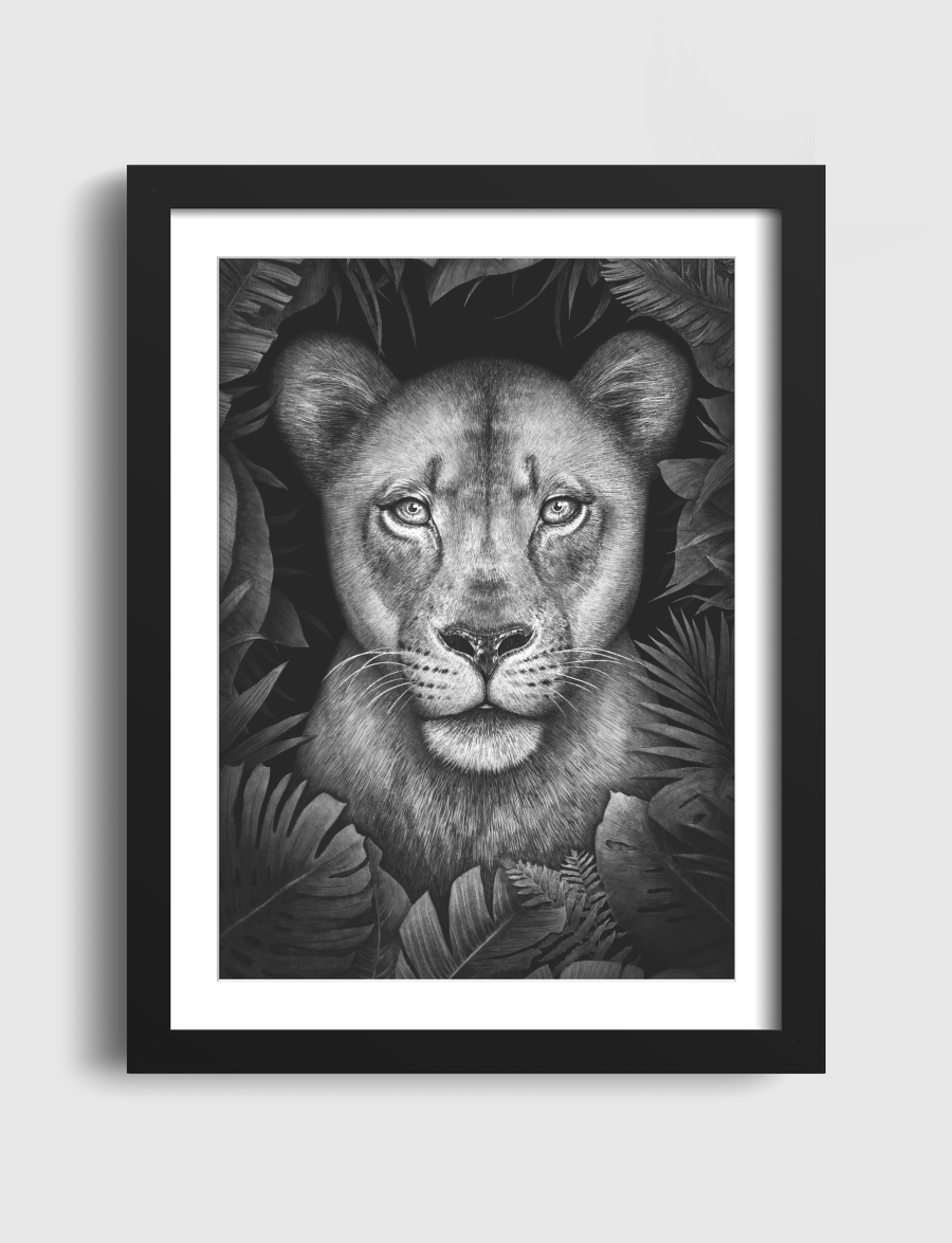Lioness in tropical leaves